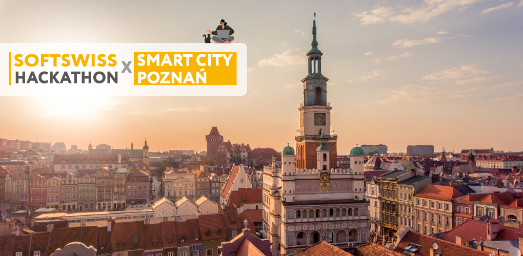 Zdjęcie panoramy Poznania z Ratuszem, na której umieszczony jest napis: Softswiss Hackathon x Smart City Poznań